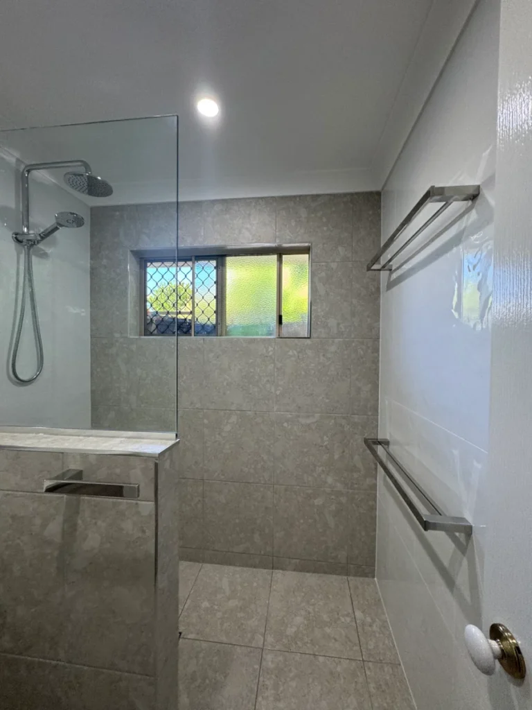 Grey and white tiles with chrome fixtures