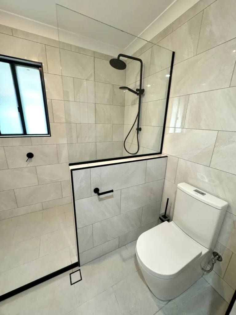 Crisp and clean, grey and black bathroom
